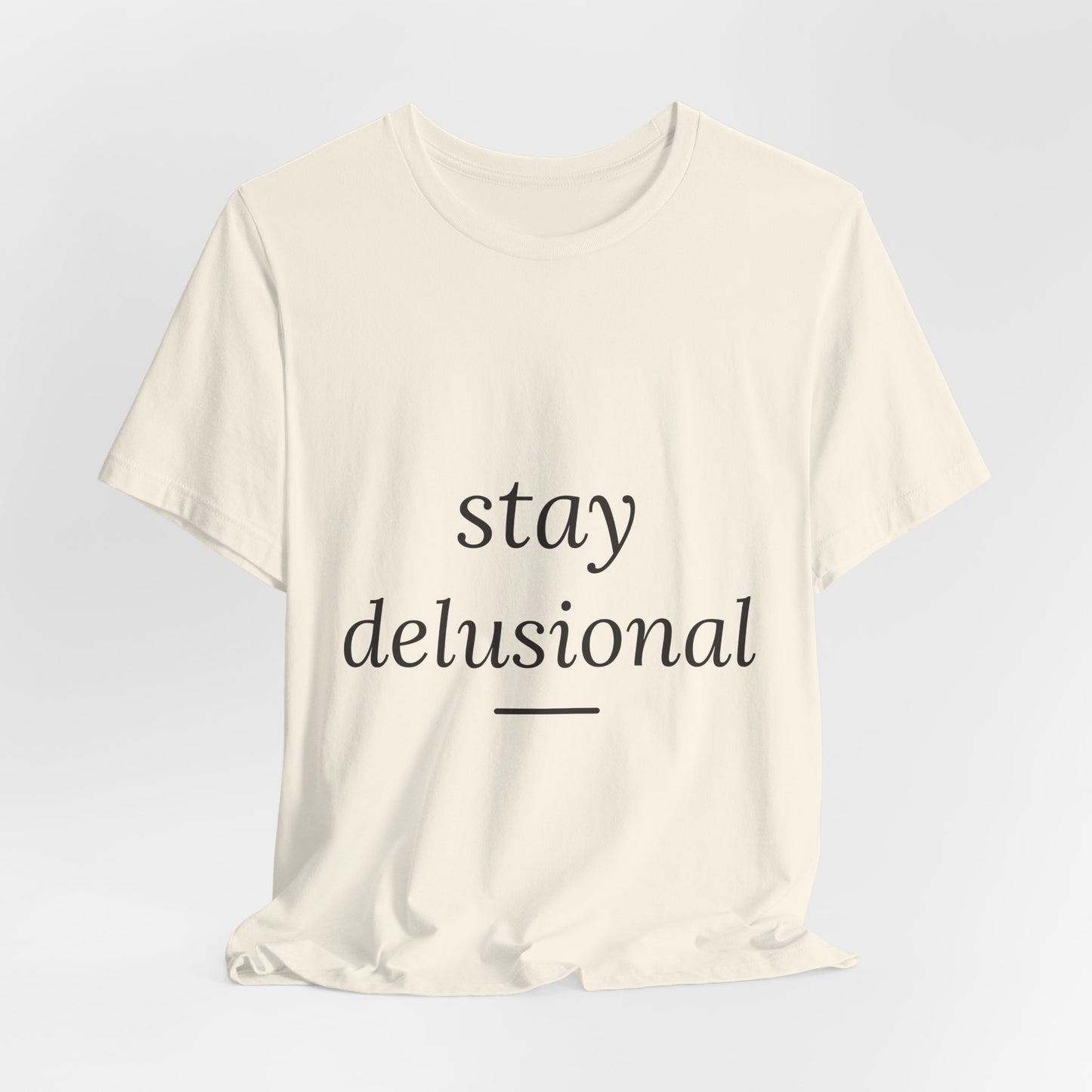 Stay Delusional — Ironic Serif Tee