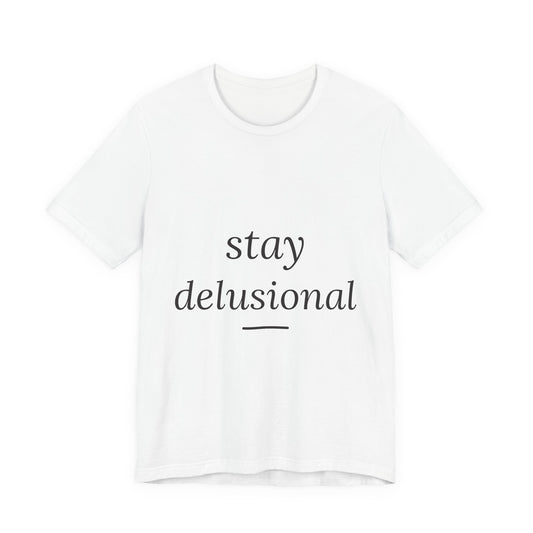 Stay Delusional — Ironic Serif Tee